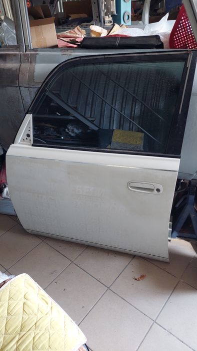 Двери Toyota XB 2006 год