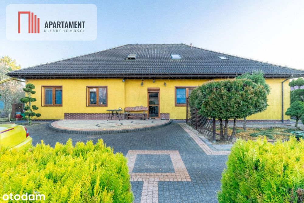 Dom: dwa mieszkania i przestrzeń na działalność