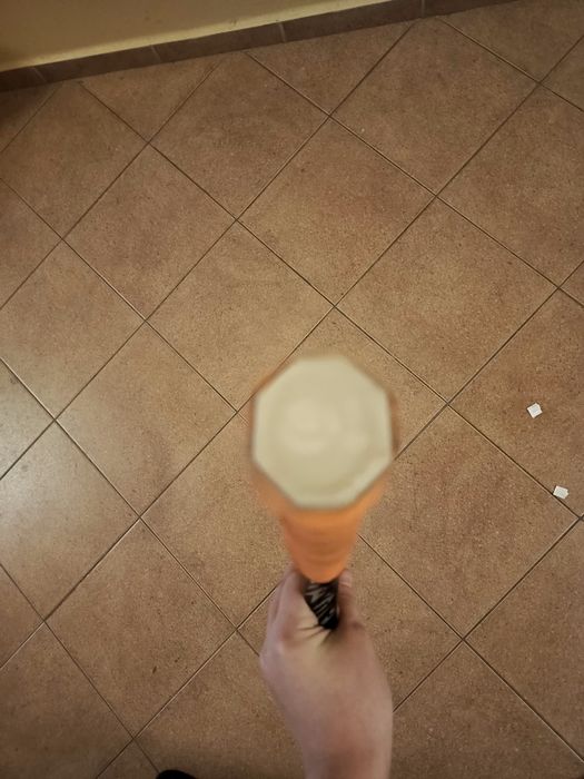 Profesjonalna rakieta pomarańczowo-czarna ARTENGO do tenisa ziemnego