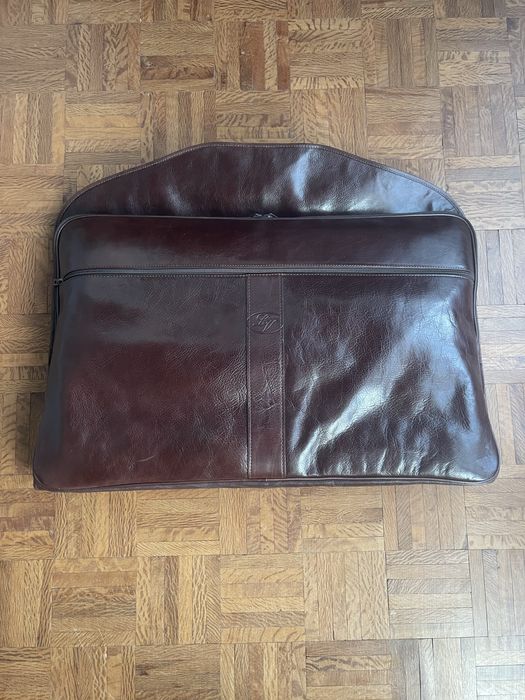 Porta fatos em pele