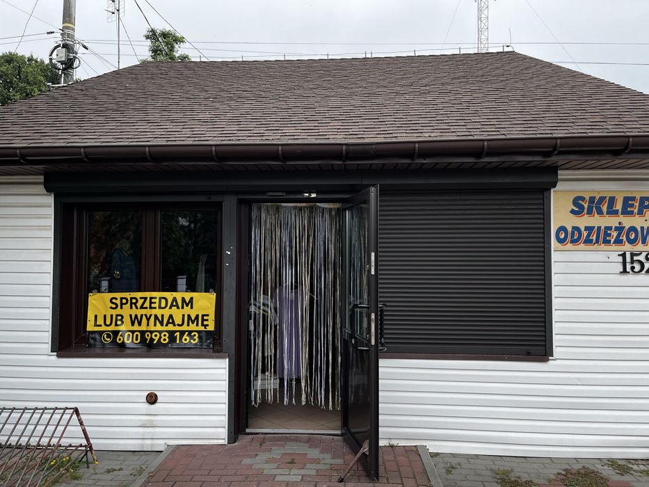 Budynek handlowo usługowy sklep odzieżowy salon fryzjerski kosmetyczny