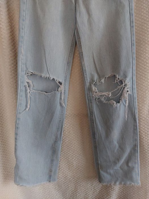 Jeansy wide leg z przetarciami. Pull & Bear rozmiar 34/XS