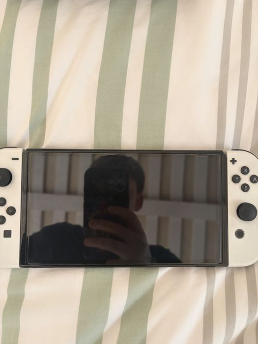 Nintendo switch oled com comando