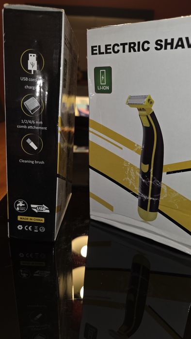 Máquina de barbear e cortar pelos ou cabelo