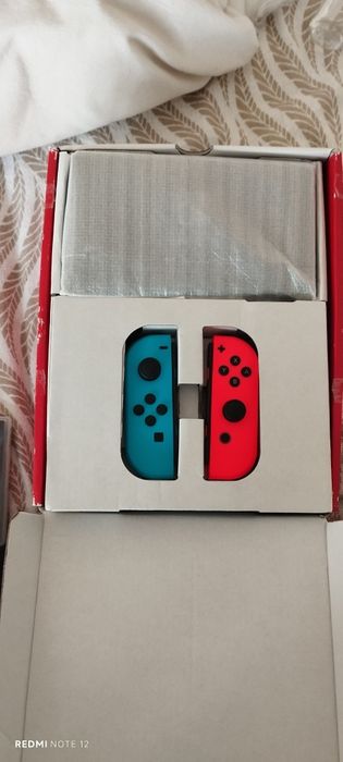 Nintendo Switch V2 ainda com garantia e todos os acessórios + Pokémon