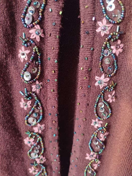 Elegancki kardigan z haftem S.O.F
Na sprzedaż oferuję