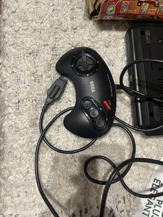 Mega drive ll com caixa original e comando/ ps2 com comando avariado e jogos