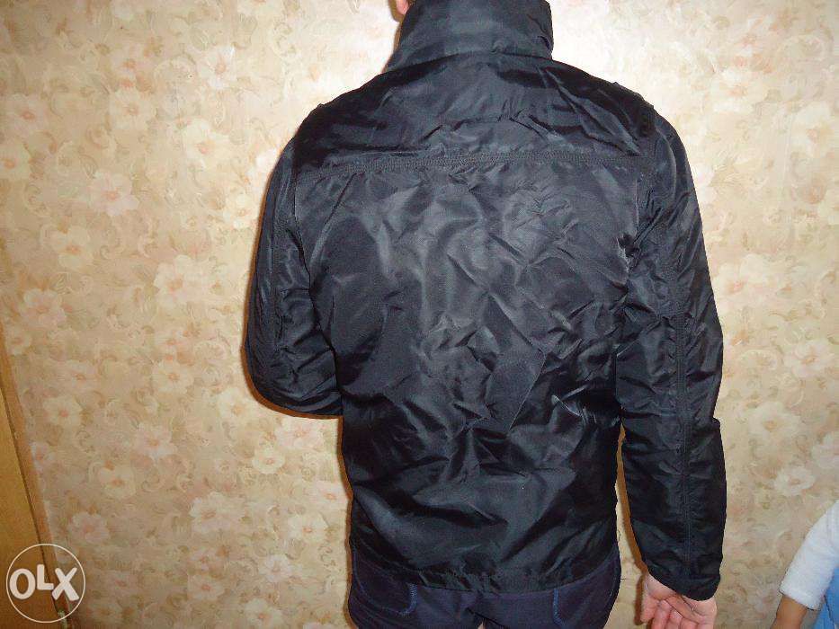 Курточка демисезонная Junker Casual Wear.На замочках компасы.