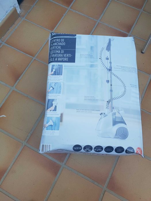 Maquina de engomar a vapor.64285416439297126