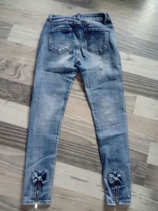 Spodnie z kokardkami nowe z metką