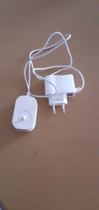 Carregador colgate omron