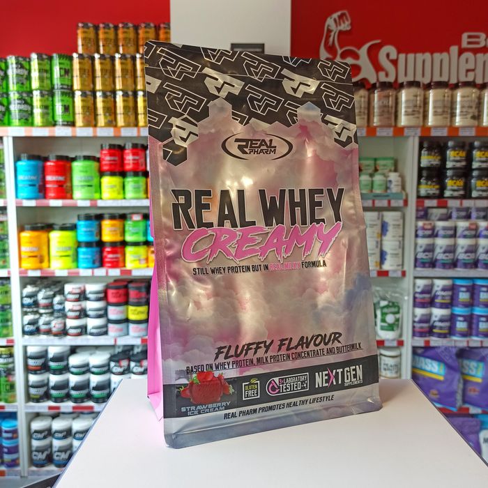 Real Pharm Whey Creamy 700g Białko WPC Szejk Białkowy Lody Truskawkowe