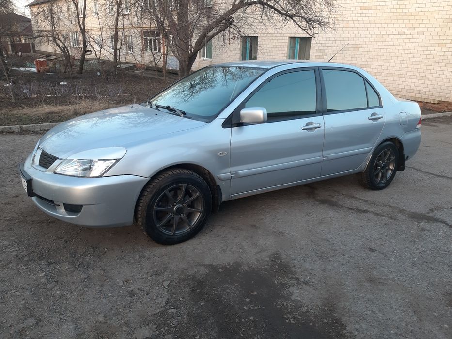 Мітцубісі Ланцер  9 з газом 4.