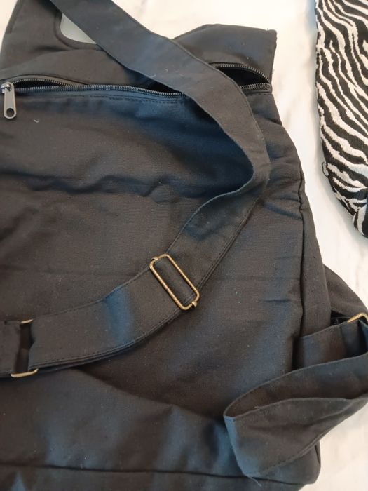 1 mochila mais saco de tecido  novos