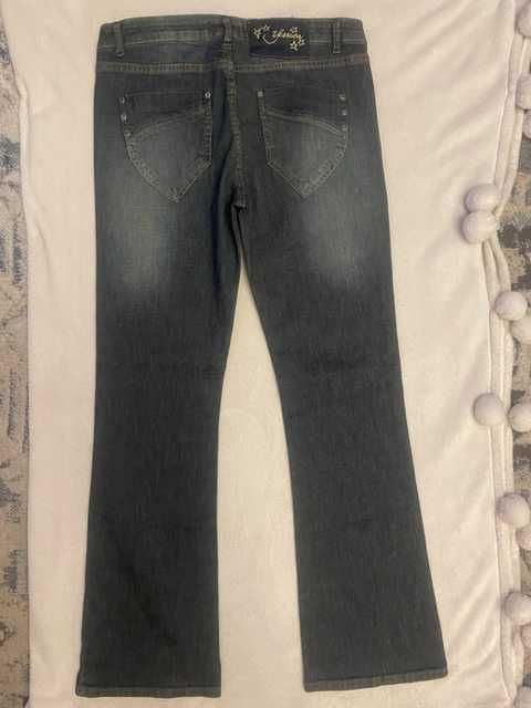 Spodnie damskie jeans yessica - rozmiar 42/44