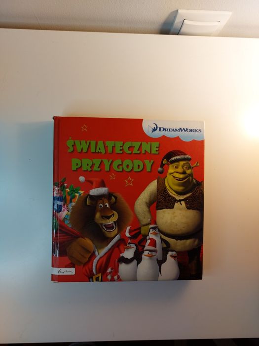 Książka Dreamworks świąteczne przygody  Shrek pingwiny panda strażnicy
