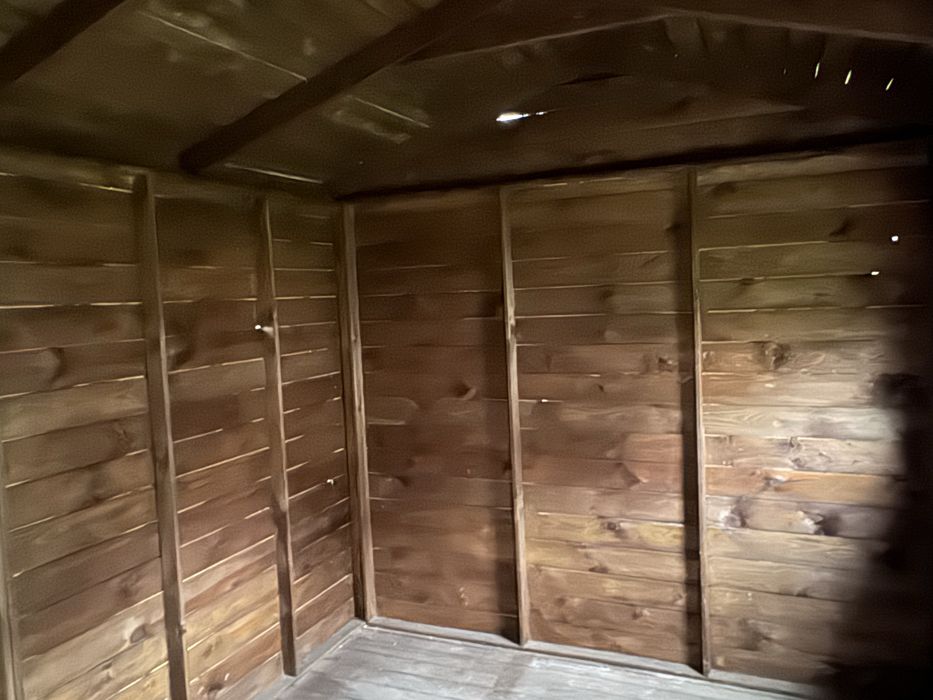 Drewniany domek ogrodowy