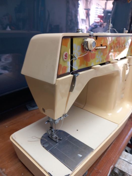 Maquina portátil singer
