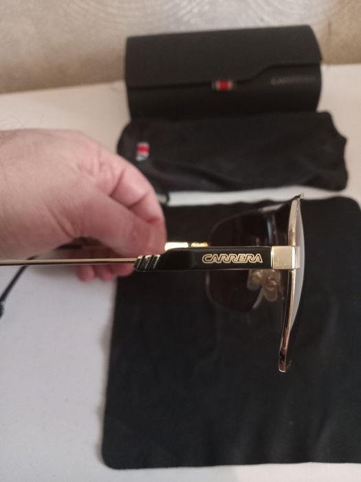 Продаю фирменные солнцезащитные очки Каррера !