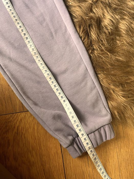 Jasnofioletowe dresy spodnie damskie r.XS 4F