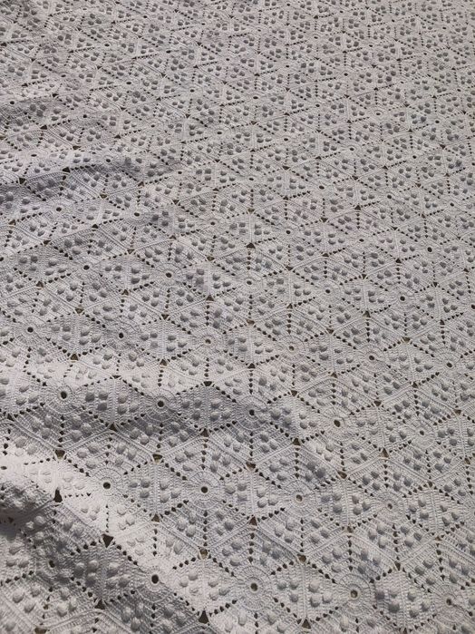 Colcha de renda feita à mão