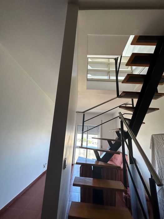 Escada "caracol" interior