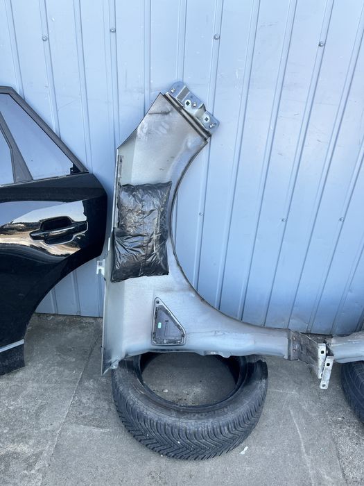 Blotnik lewy Ford S-Max MK2 UF