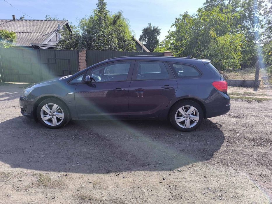 машина opel astra j 2014