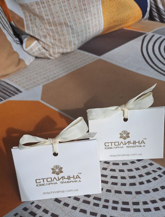 Подарункові коробочки та пакетики для прикрас
