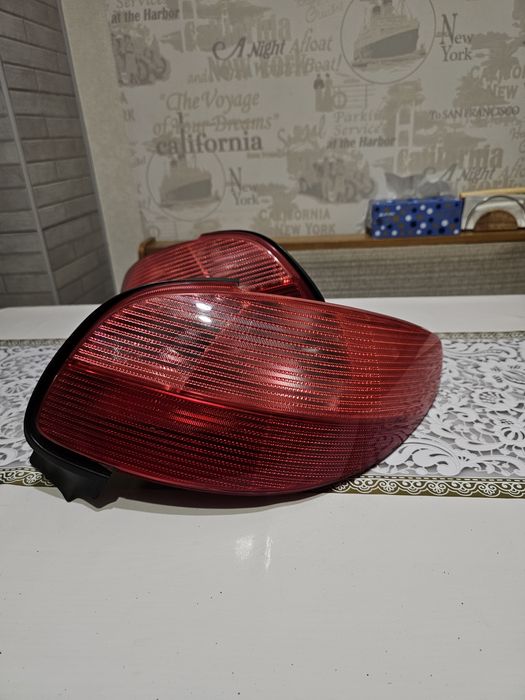 Задні фари Peugeot 206 дорестайлінг та рестайлінг