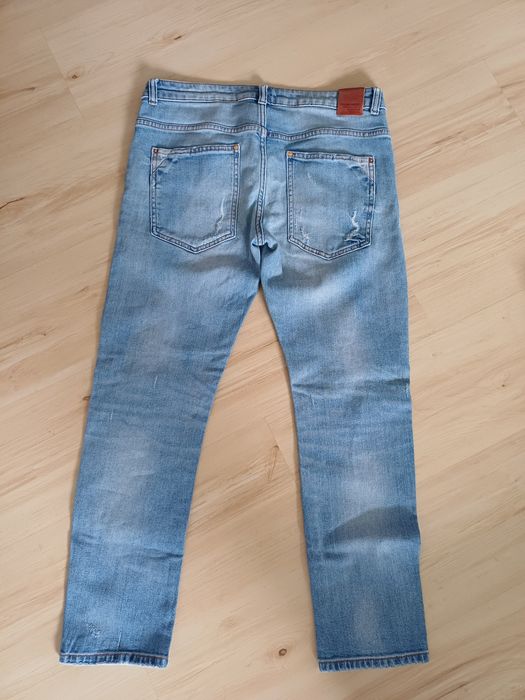 Świetne spodnie dżinsowe Zara 1975 r. 38