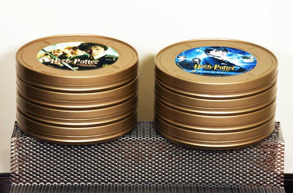 HARRY POTTER Colecção completa 8 filmes da saga em latas promocionais