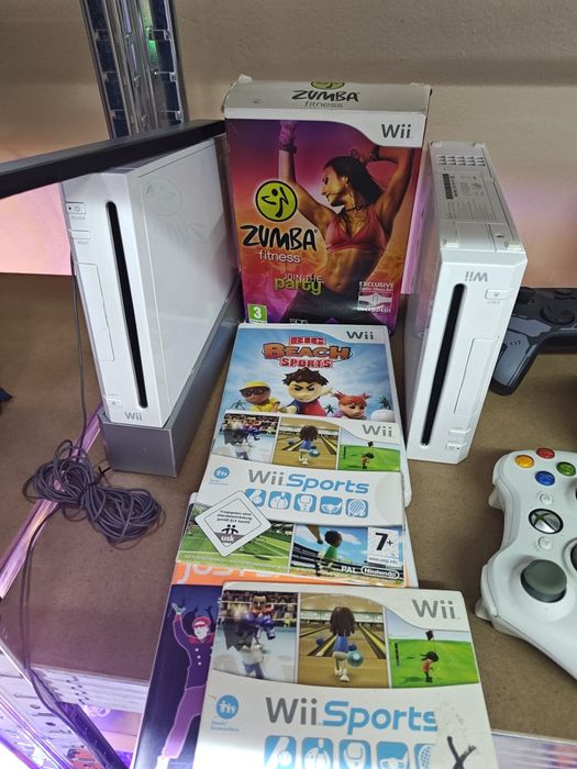 Konsola Nintendo Wii komplet  plus ...gitara .