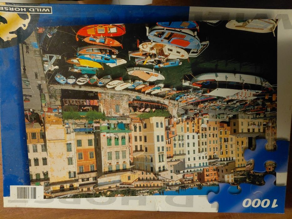 Caixa com 18 puzzles