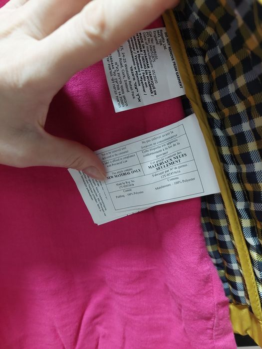 stylowa kamizelka damska Regatta w kolorze musztardowym.