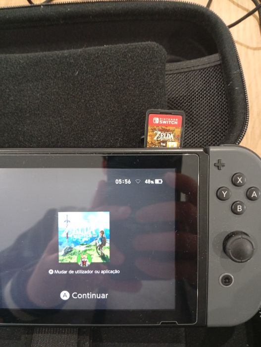 Nintendo Switch + Mario Kart + Zelda BOTW + Pokémon Shield + Extras