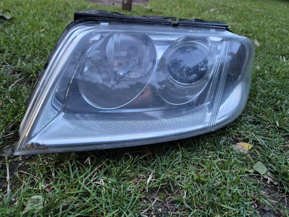 Passat B5FL lampa lewa OEM Hella i inne części OEM