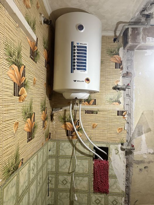 Ремонт бойлера  водонагревателя чистка установка продажа