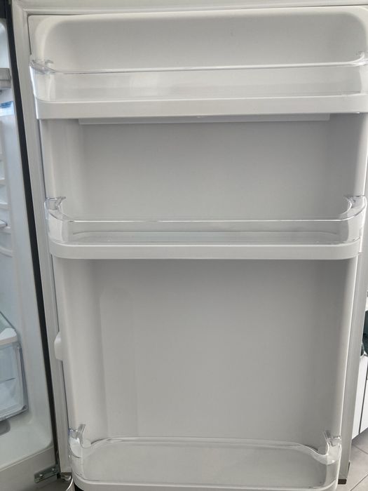 Garantia 2 anos - Frigorífico Combinado INDESIT CAA 55 NX 1