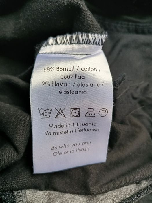 Spodnie slim elastyczne guziki kieszenie bawełna