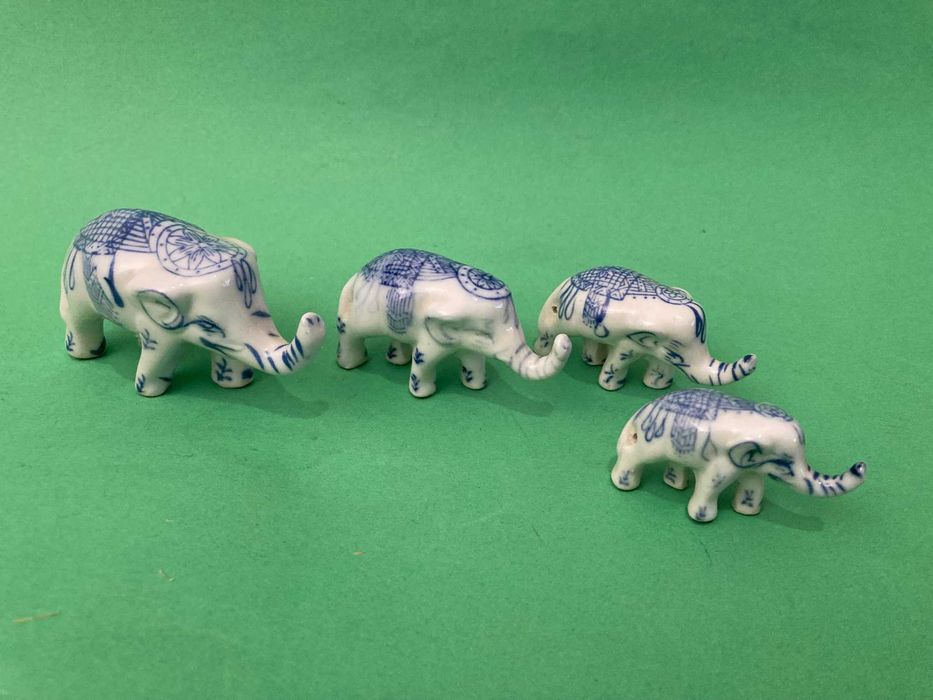Lot of 4 Decorative Antique Porcelain Elephants
