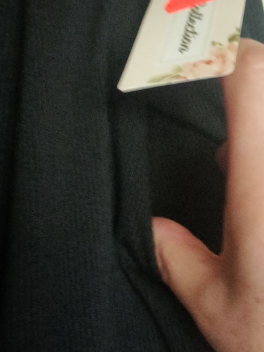 Piękne nowe czarne szerokie spodnie w prążek