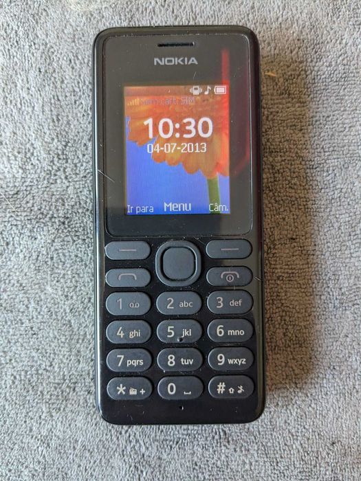 Telemóvel Nokia 108 com carregador em bom estado
