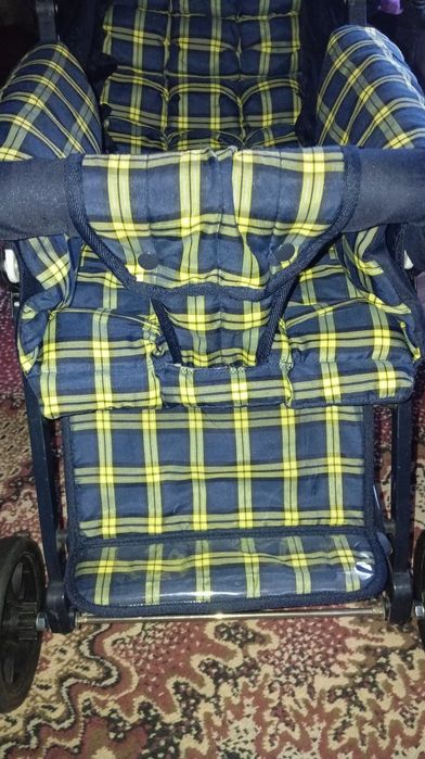 Дитяча прогулянкова коляска