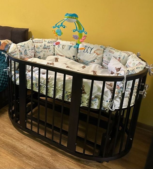 Дитяча кроватка з маятником!