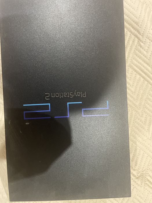 Vende se Ps2 usada + 2 comandos
