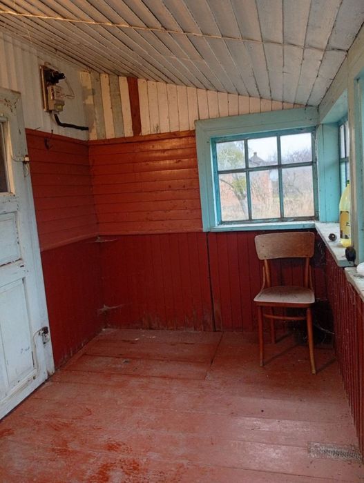 Будинок + дерев'яний гараж на 2 місця