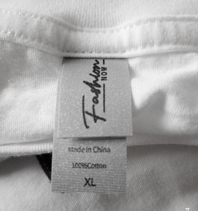 Біла футболка з крилами