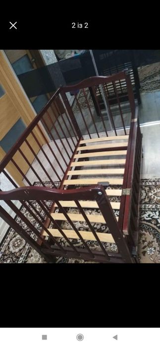 Дитяча кроватка-