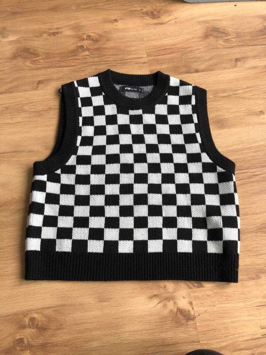 Жилетка в клітинку в'язана